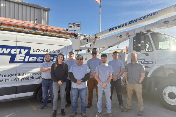The Midway Electric team in front of the company fleet in Columbia, Missouri