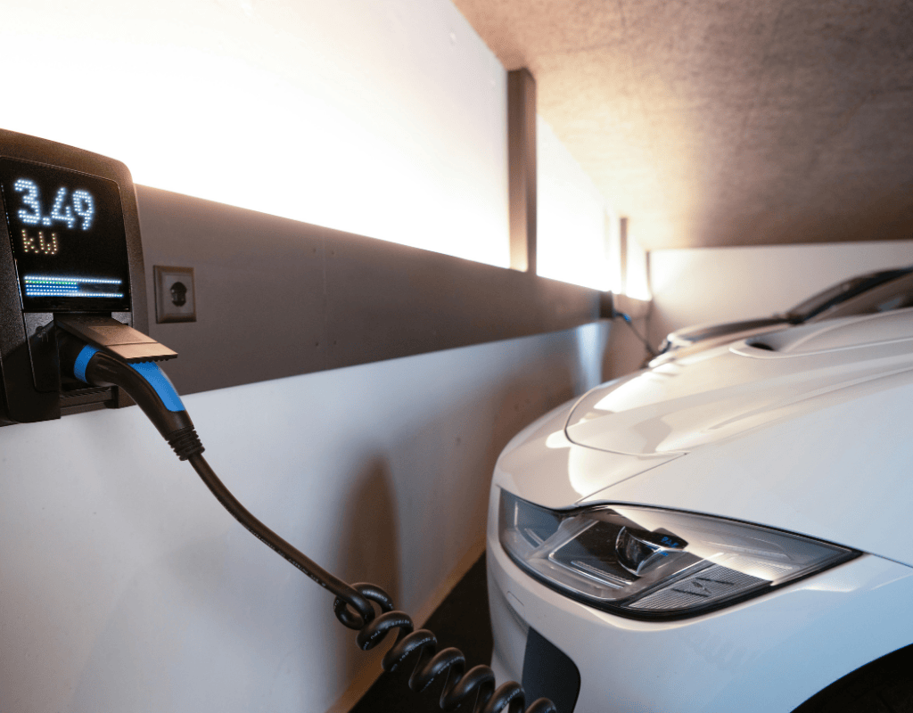 electric vehicle charging in garage with installed charger in Columbia MO